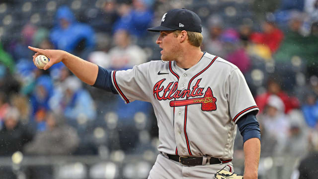 Apr 15, 2023; Kansas City, Missouri, USA; Atlanta Braves starting pitcher Bryce Elder (55) directs his infielders during the first inning against the Kansas City Royals at Kauffman Stadium.